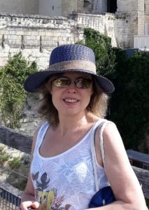 Manuela in a hat in summer